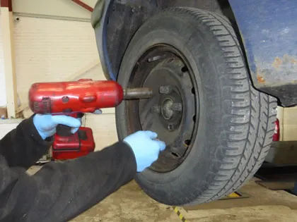 Taking a wheel off with an impact wrench